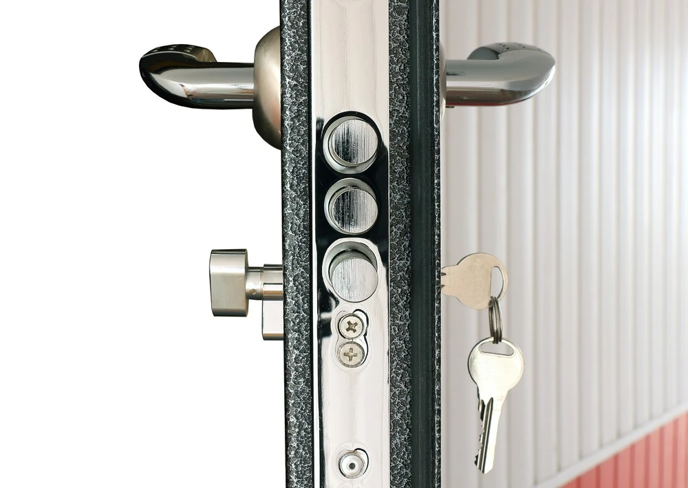 British Standard insurance-approved lock being installed on a front door